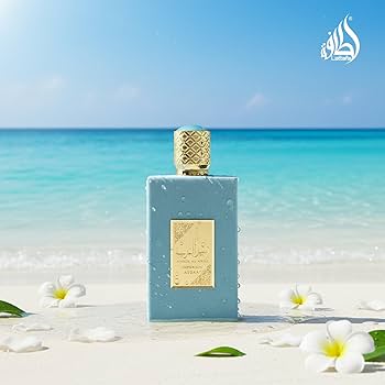 Lattafa Ameer Al Arab Imperium Parfum 100ml blue perfume bottle displayed on a tropical beach with white flowers and ocean background
